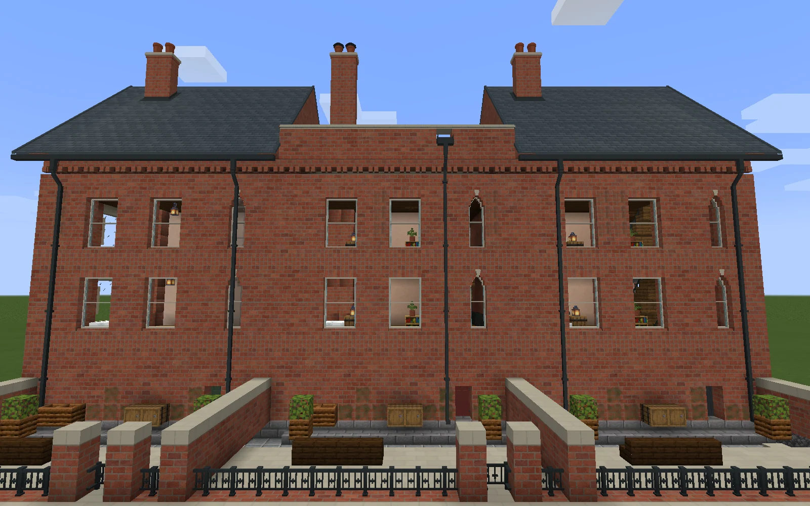 Three small rear courts have capped brick walls, iron gates and benches below the terrace rear windows and rainwater pipes.